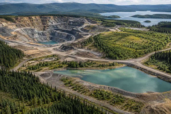 Aerial view of mining disturbance and recovering vegetation